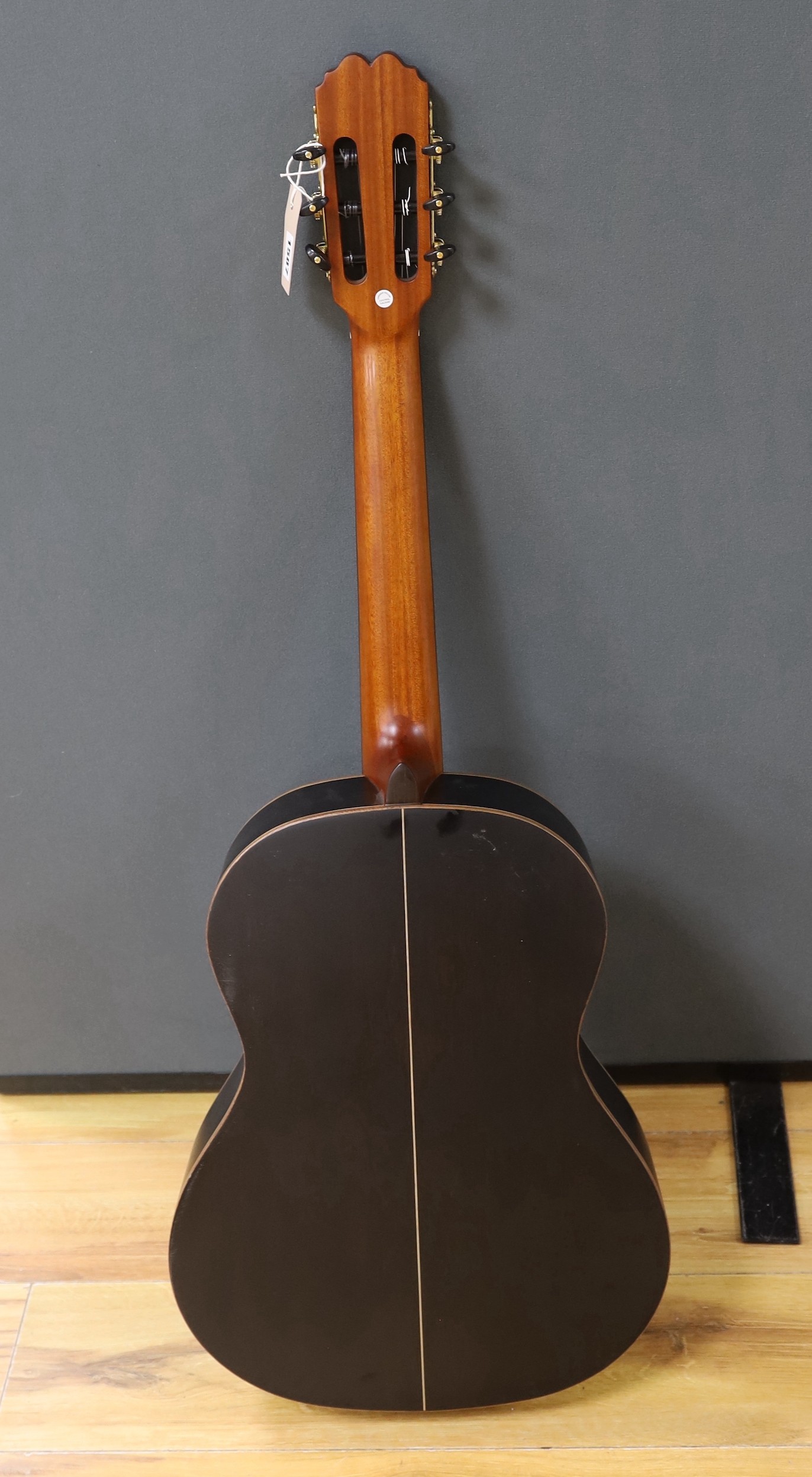 An Admira 'Concerto' classical guitar. Cedar top, satin finish with rosewood back and sides
